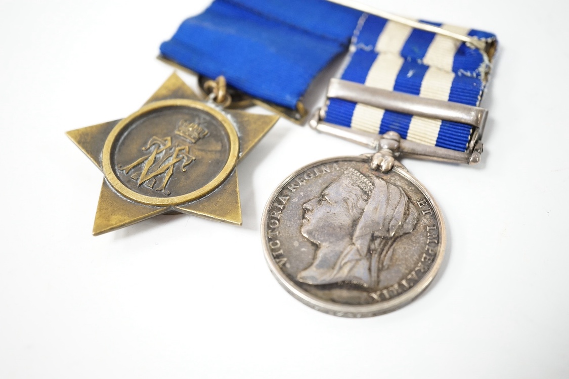 A Queen Victoria medal pair comprising an 1882 Egypt Medal and an Egypt Star, awarded to Lieutenant Colonel R. Vivian, engraved in italicised uppercase script. 1st Scots Guards. Condition - fair to good.